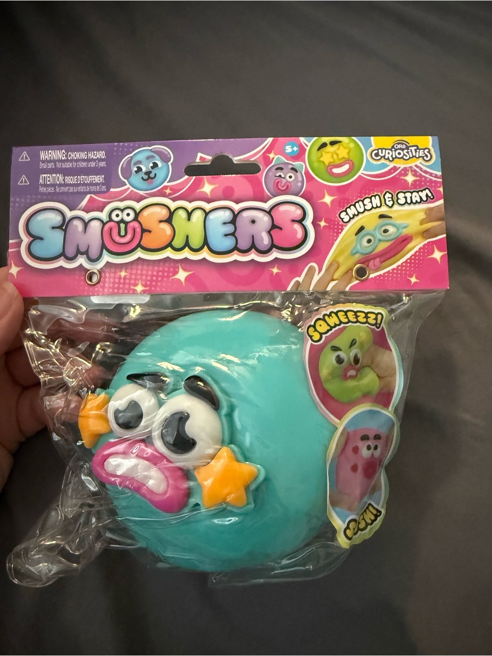 Smushers Teal Squeeze Face Toy by Orb Curiosities